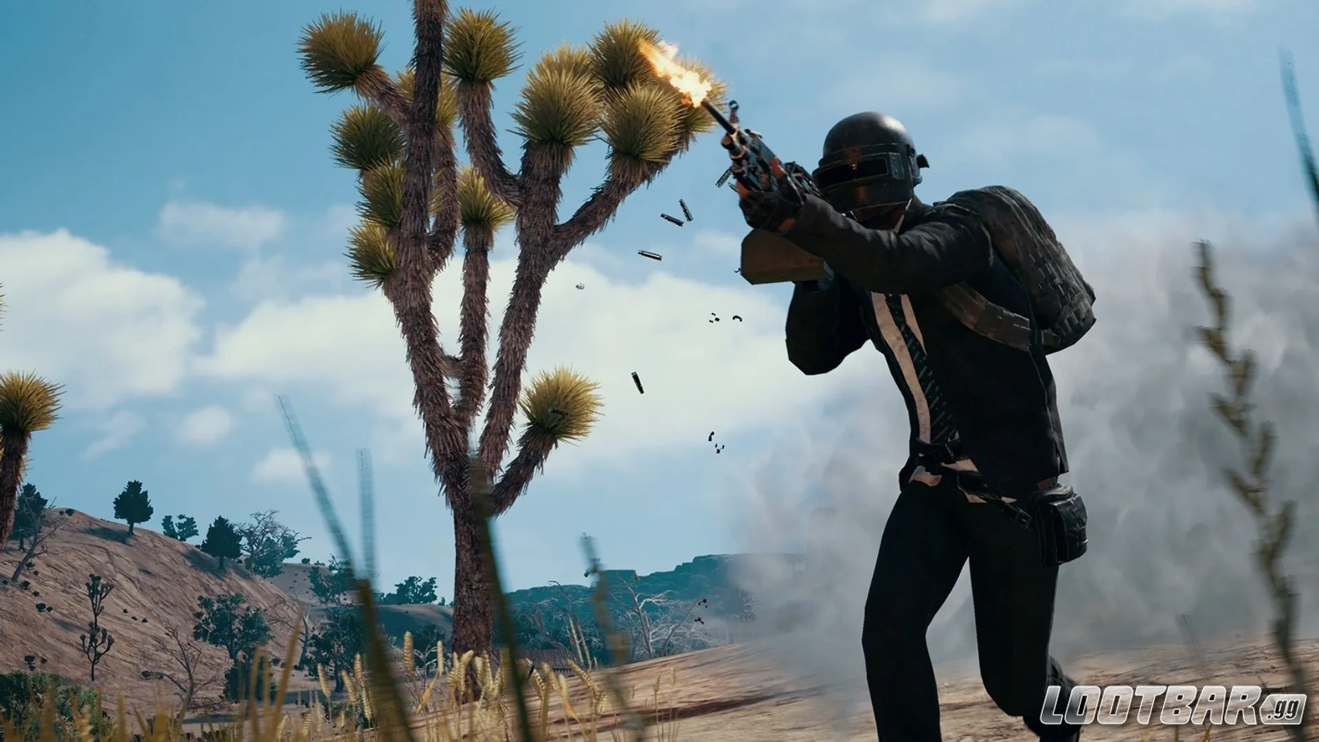 PUBG Mobile character dressed in a black suit shooting an M249 